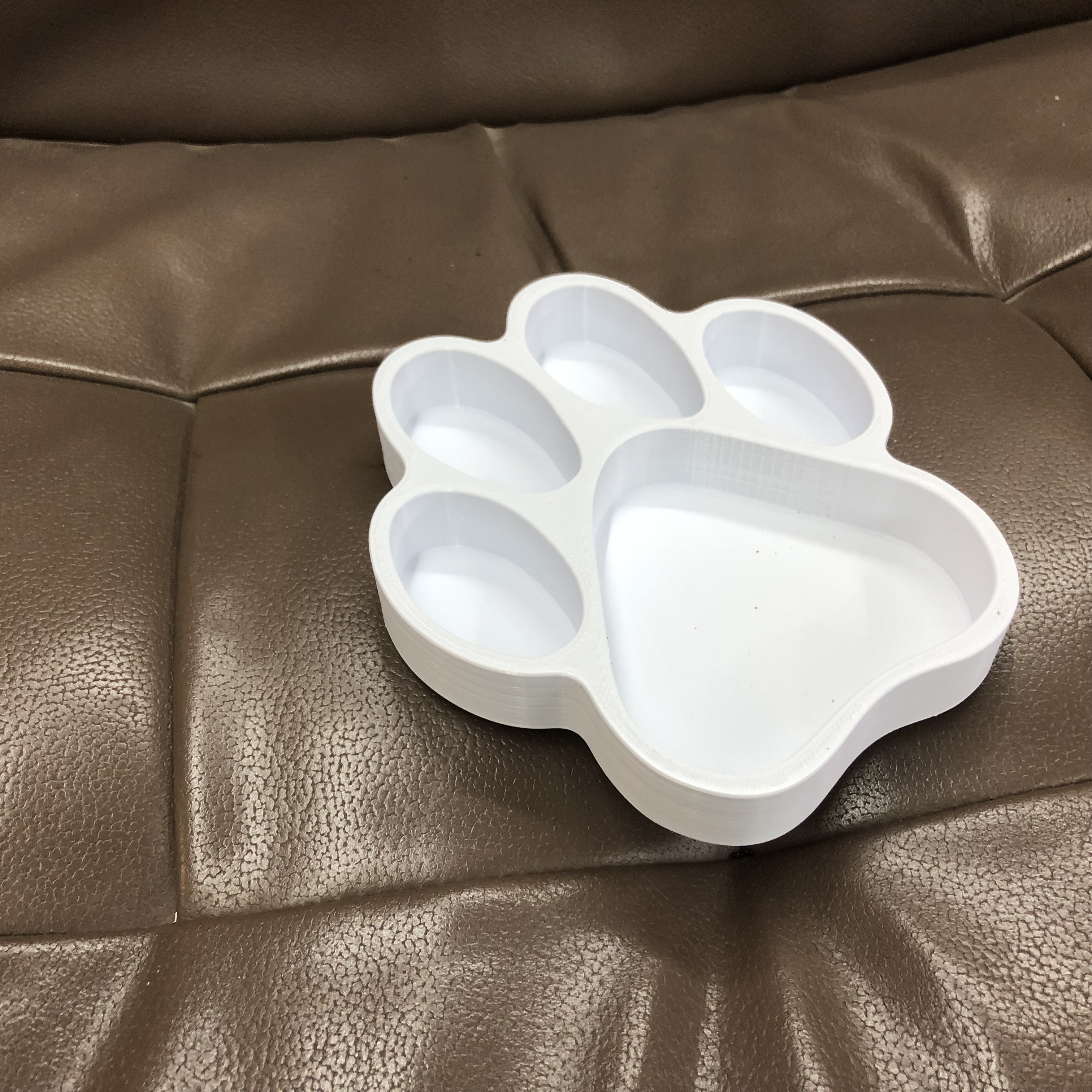 Paw shaped nut bowl Tan color