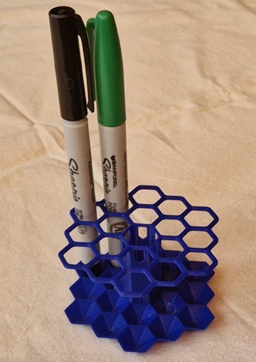 Matte Blue Hex Pen holder, round, straight vertical pen positions.