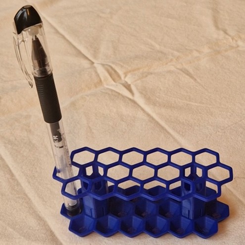 Matte Blue Hex Pen holder, "rectangular" with straight vertical pen positions. 