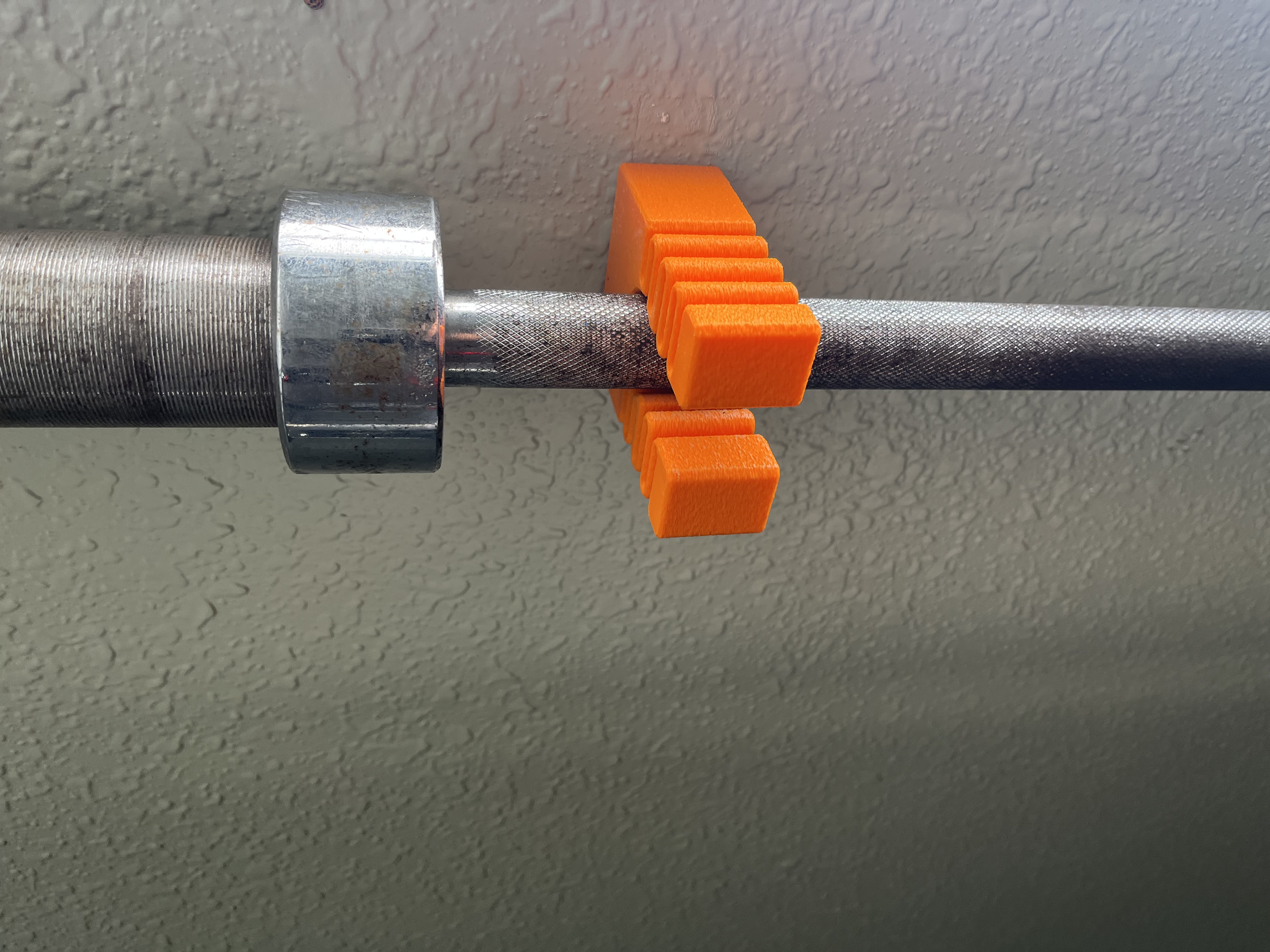 45 lb Olympic Bar Wall Mount