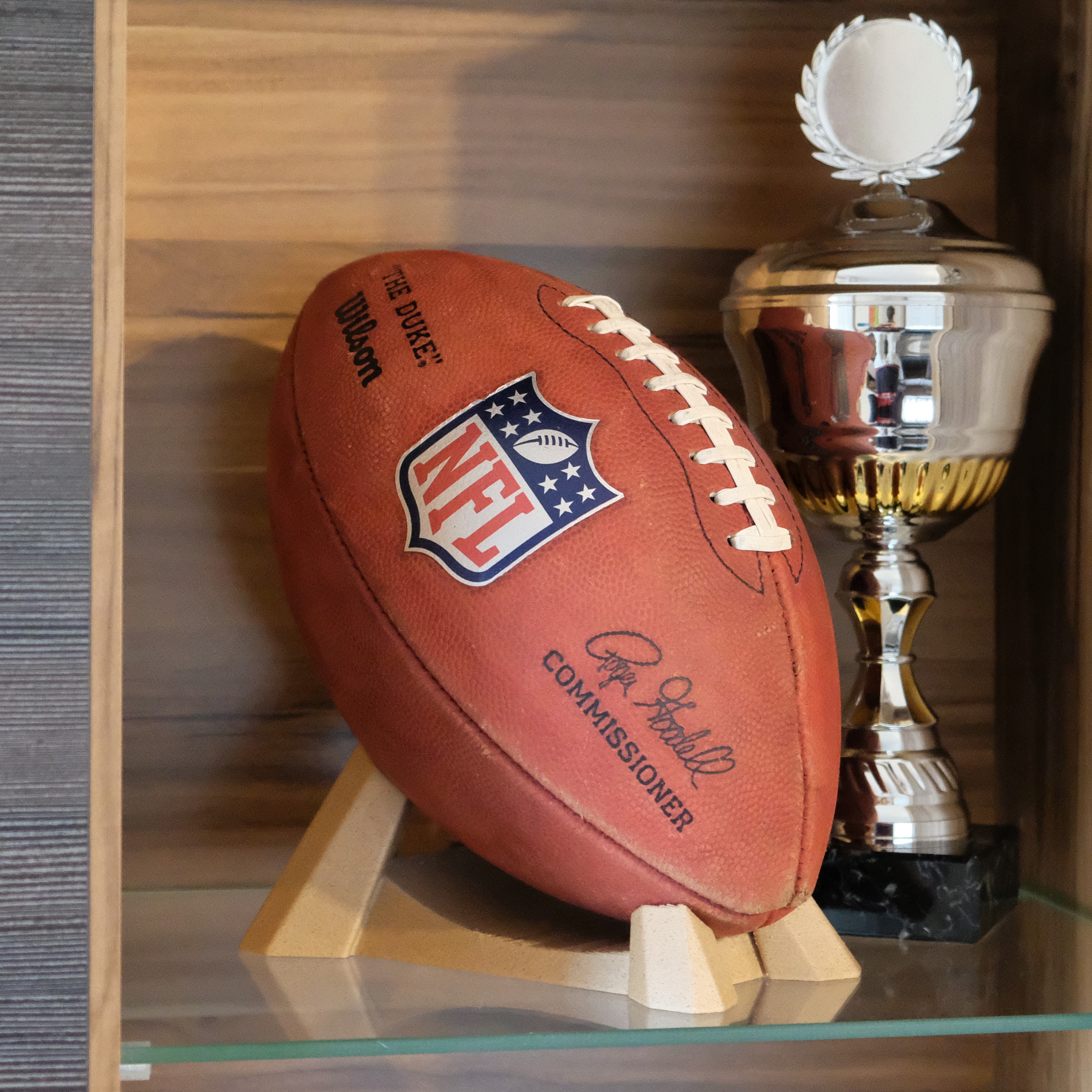 Stylish stand for American Football - angled